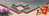 Zementfliese Rosette blau creme rot